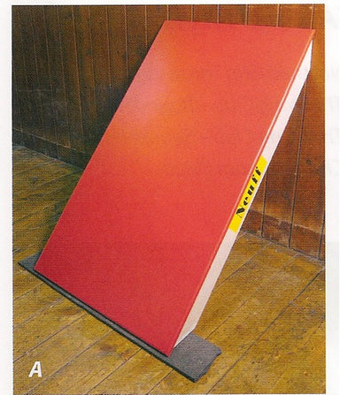 Solid board leant up against a wall at an angle.  Used to help quick turning against the wall when running indoors.